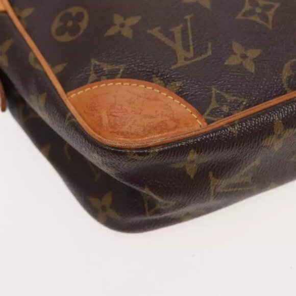authenticity guaranteed LOUIS VUITTON Monogram Compiegne Clutch Bag - Picture 9 of 16